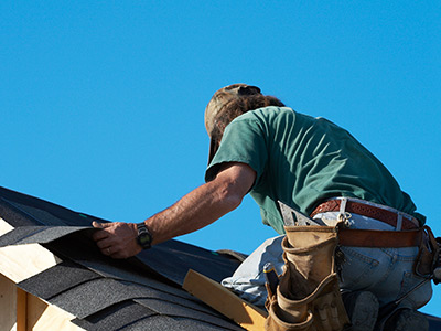 Contractor Performing Roof Repair
